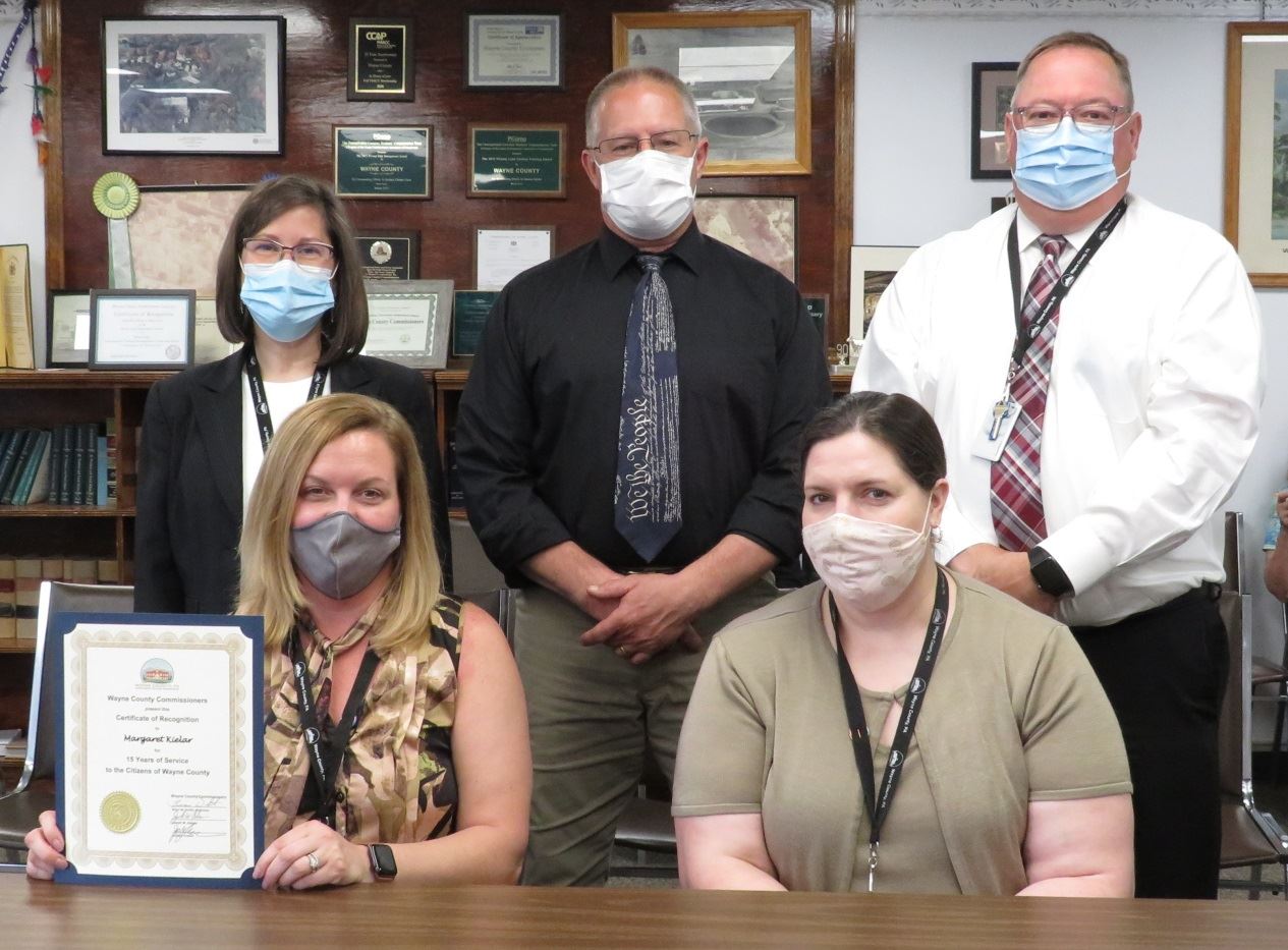 Maggie Keilar with the Commissioners marking 15 years of service to the people of Wayne County.